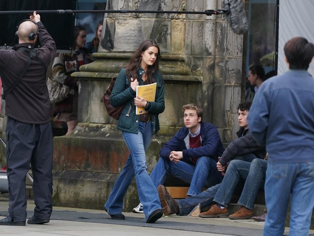 Bellamy was dressed in clothes that would not have been out of place in the early 2000s – when the couple attended the university – including bootcut jeans with a pleated leather belt, and high-heeled suede boots.