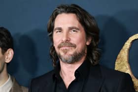 DC fans are divided over whether they spotted Christian Bale’s Batman in the new trailer for The Flash