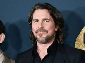 DC fans are divided over whether they spotted Christian Bale’s Batman in the new trailer for The Flash