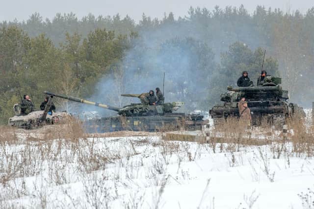 Ukrainian armoured vehicles conduct live-fire exercises near the town of Chuguev (Picture: Sergey Bobok/AFP via Getty Images)