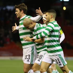 Celtic's Matt O'Riley runs to celebrates with the visiting support at Pittodrie after claiming his first goal for the club. His deflecred effort made it 2-0 in an ultimately tense encounter, eventually won 3-2 by Ange  Postecoglou's men after they were pegged back to 2-2.  (Photo by Craig Williamson / SNS Group)