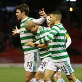Celtic's Matt O'Riley runs to celebrates with the visiting support at Pittodrie after claiming his first goal for the club. His deflecred effort made it 2-0 in an ultimately tense encounter, eventually won 3-2 by Ange  Postecoglou's men after they were pegged back to 2-2.  (Photo by Craig Williamson / SNS Group)