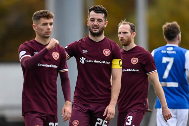 Hearts' goalscorer Craig Halkett (centre) at full time after the 1-0 win over Cowdenbeath at Bayview Stadium in the Betfred Cup. (Photo by Rob Casey / SNS Group)