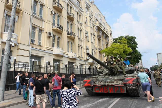 Members of Wagner group sit atop of a tank in a street in the city of Rostov-on-Don. Picture: AFP via Getty Images