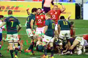 Duhan van der Merwe leads the British & Irish Lions celebrations as Luke Cowan-Dickie stretches over to score their side's try. Picture: David Rogers/Getty Images
