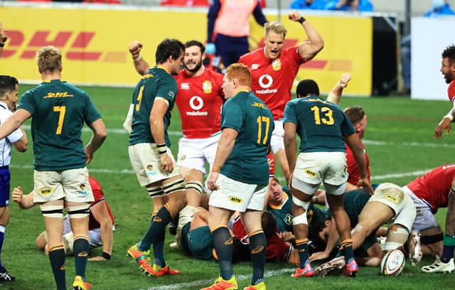 Duhan van der Merwe leads the British & Irish Lions celebrations as Luke Cowan-Dickie stretches over to score their side's try. Picture: David Rogers/Getty Images