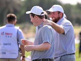 Shane Lowry congratulates Bob MacIntyre after one of his wins for Great Britain and Ireland in the inaugural Hero Cup in Abu Dhabi. Picture: Ross Kinnaird/Getty Images.
