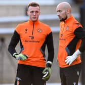 Dundee United's Jack Newman and Carljohan Eriksson, right, prior to a Premier Sports Cup against Livingston.
