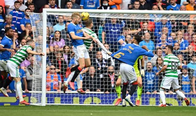 Filip Helander heads home the only goal of the game for Rangers in the first Old Firm league match of the season at Ibrox last August. (Photo by Rob Casey / SNS Group)