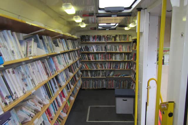 Inside the yellow mobile library. PIC: Contributed.