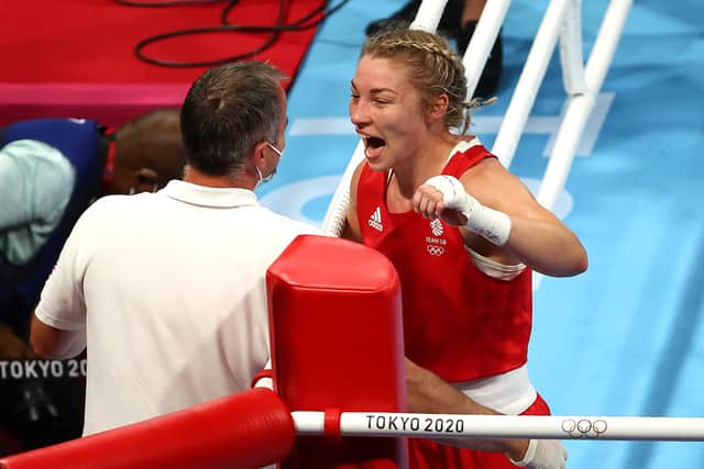 Lauren Price celebrates victory against Nouchka Fontijn