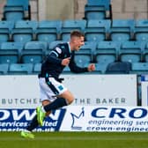 Luke McCowan celebrates after scoring to make it 1-0 to Dundee.