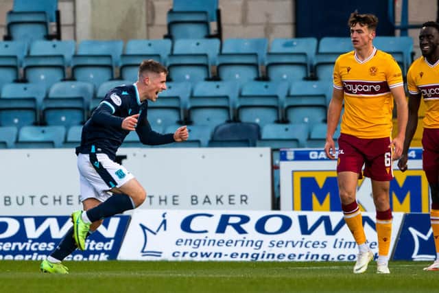 Luke McCowan celebrates after scoring to make it 1-0 to Dundee.