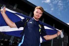 Tommy Conway arrives at Edinburgh Airport after being called up to the Scotland Euro 2024 squad. (Photo by Ross MacDonald / SNS Group)