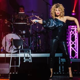 Elesha Paul Moses as Tina Turner