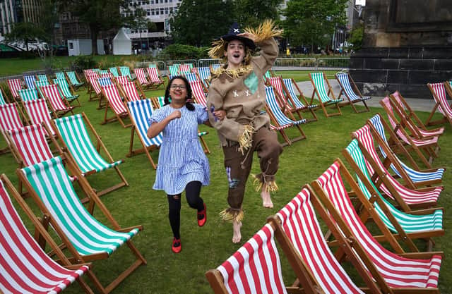 Dorothy and the Scarecrow prepare for an outdoor showing of The Wizard of Oz during the Edinburgh International Film Festival last year