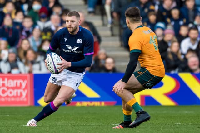 Finn Russell takes the game to Australia. (Photo by Ross Parker / SNS Group)
