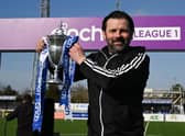 Cove Rangers manager Paul Hartley with the cinch League One trophy. (Photo by Ross MacDonald / SNS Group)