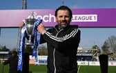 Cove Rangers manager Paul Hartley with the cinch League One trophy. (Photo by Ross MacDonald / SNS Group)