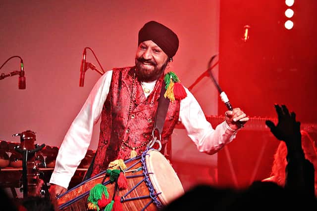 Band stalwart Johnny Kalsi performing.