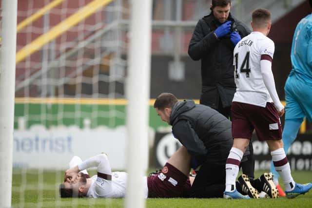 Hearts defender Craig Halkett damaged his knee during the 2-2 draw against Dundee United on Christmas Eve.