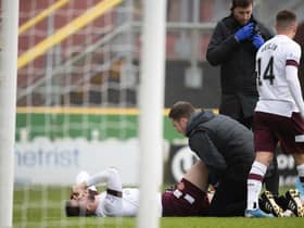 Hearts defender Craig Halkett damaged his knee during the 2-2 draw against Dundee United on Christmas Eve.