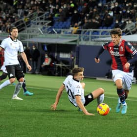 Aaron Hickey has been in good form for Bologna, earning a Scotland call-up.
