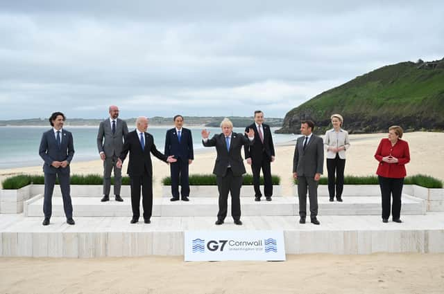 World leaders, seen meeting at the G7 Summit In Carbis Bay, Cornwall, in June, have agreed to a minimum 15 per cent tax corporate rate (Picture: Leon Neal/WPA pool/Getty Images)