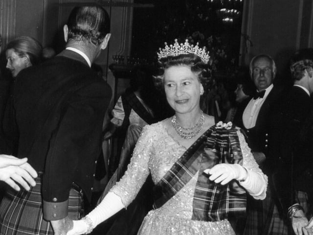The Queen at the centenary ball of the Royal Scottish Pipers' Society, in Edinburgh, in 1982.