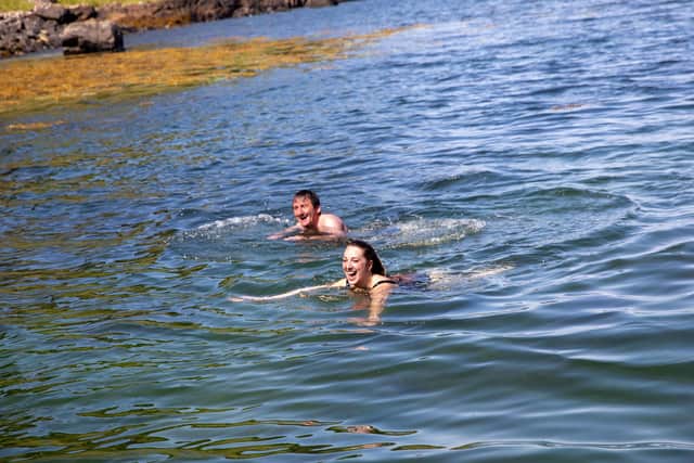 Presenters Vicky and Duncan wild swimming