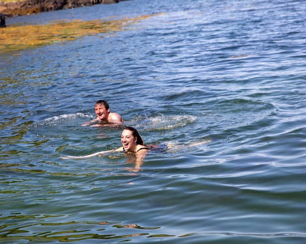 Presenters Vicky and Duncan wild swimming