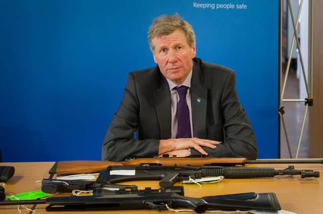15th May 2014. Justice Minister Kenny MacAskill with air guns which have been handed into the police by responsible owners. The guns in the wrong hands could be used for crime. Credit Steven Scott Taylor.