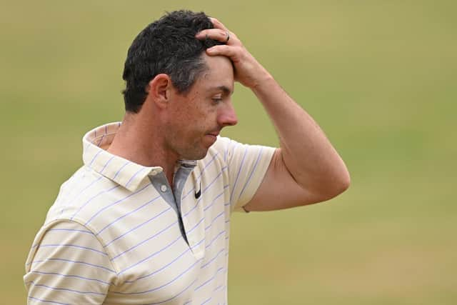 Rory McIlroy looks dejected on the 18th green after missing out on winning the 150th Open at St Andrews. (Photo by Ross Kinnaird/Getty Images)