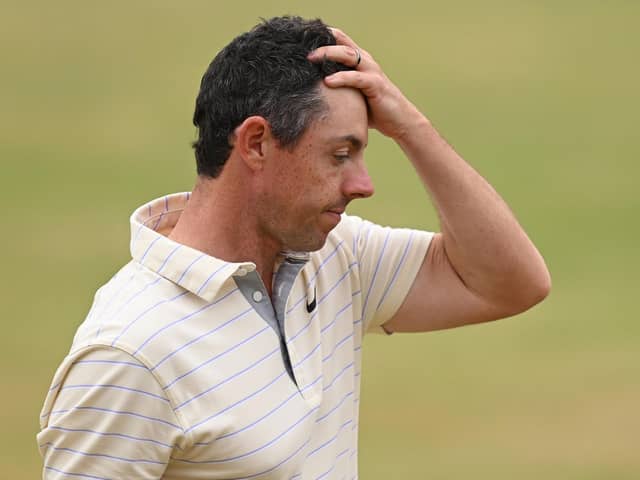 Rory McIlroy looks dejected on the 18th green after missing out on winning the 150th Open at St Andrews. (Photo by Ross Kinnaird/Getty Images)