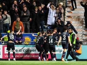 Falkirk's Kai Kennedy celebrates with teammates after scoring to make it 2-1 during a Scottish Cup quarter final match between Falkirk and Ayr United at the Falkirk Stadium, on March 12, 2023, in Falkirk, Scotland.  (Photo by Mark Scates / SNS Group)