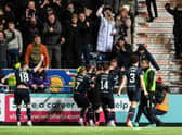 Falkirk's Kai Kennedy celebrates with teammates after scoring to make it 2-1 during a Scottish Cup quarter final match between Falkirk and Ayr United at the Falkirk Stadium, on March 12, 2023, in Falkirk, Scotland.  (Photo by Mark Scates / SNS Group)