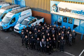 The Taylor Roofs' team in front of the firm's new base in Livingston, West Lothian.