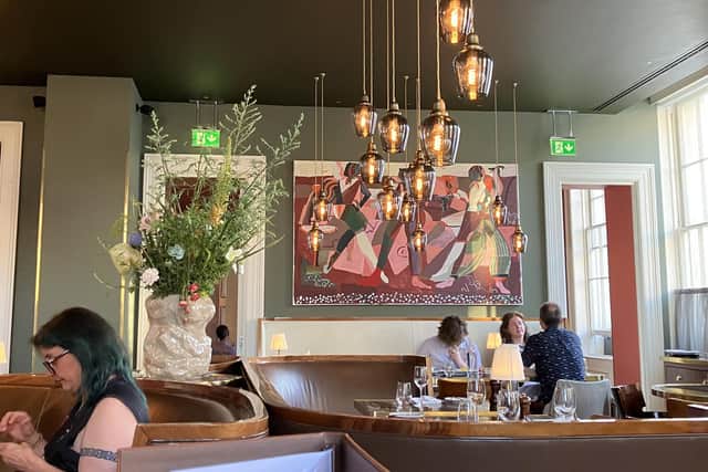 The artwork decorating the walls throughout, here in RAILS restaurant, is a feature of the Great Northern Hotel, London. Pic: J Christie