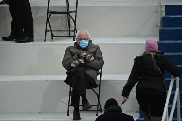 Senator Bernie Sanders was caught on camera looking cosy in his mittens at the inauguration (Getty Images)