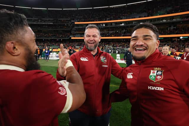 Sione Tuipulotu, right, celebrates with head coach Andy Farrell and Bundee Aki (L) after the British & Irish Lions beat Australia in the second Test at the Melbourne Cricket Ground to clinch the series. Tuipulotu missed the match through injury. (Photo by David Rogers/Getty Images)