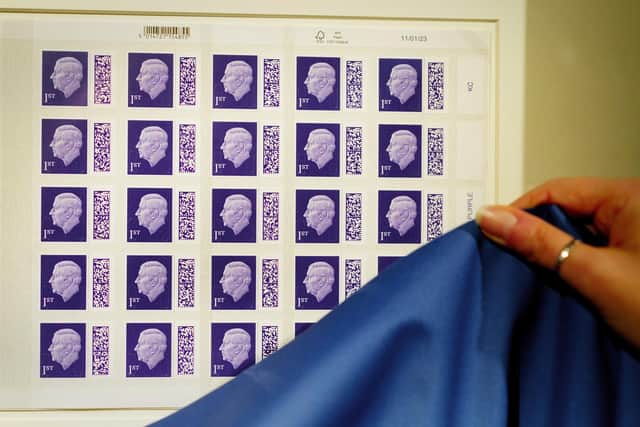 One of the first sheets of the 1st class definitive stamp featuring King Charles III is unveiled as it goes on display at the Postal Museum in central London, before they enter circulation later this year.
