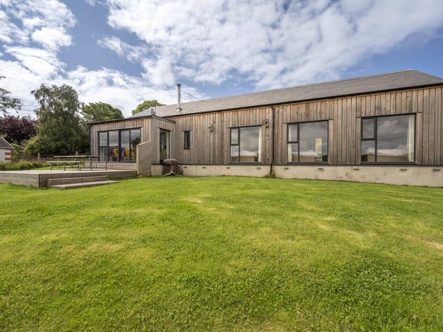 The property is called the Old Barn as it has been built on the site of a former stone barn used for drying fishing nets.