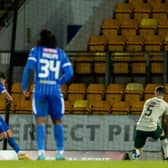Graham Carey lashes the ball home to give St Johnstone the lead against Hibs.