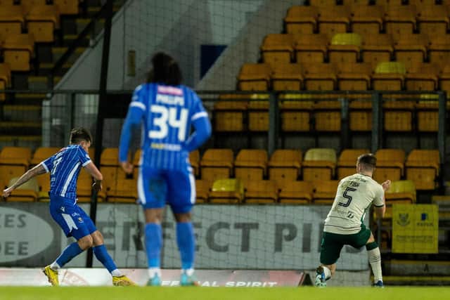Graham Carey lashes the ball home to give St Johnstone the lead against Hibs.