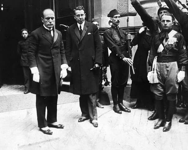October 1922:  Italian dictator Benito Mussolini (1883 - 1945) accompanied by Giacomo Acerbo, entering the Quirinale Palace, Rome, to be received by King Victor Emmanuel III, after his march on Rome. PIC: Central Press/Getty Images
