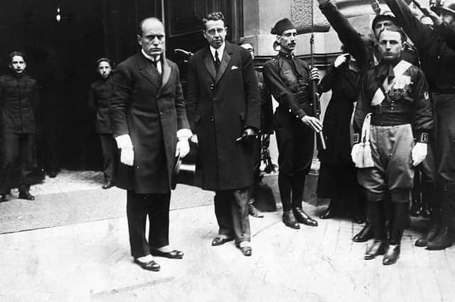 October 1922: Italian dictator Benito Mussolini (1883 - 1945) accompanied by Giacomo Acerbo, entering the Quirinale Palace, Rome, to be received by King Victor Emmanuel III, after his march on Rome. PIC: Central Press/Getty Images