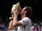 Andy Murray celebrates winning the Men's Singles Final on day thirteen of the Wimbledon Championships at the All England Lawn Tennis and Croquet Club, Wimbledon.