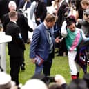 Frankie Dettori (right) reacts after placing tenth in the Betfred Derby with Arrest (Pic: Victoria Jones/PA Wire)