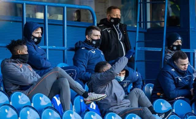 Ryan Jack (centre) looks on from the main stand at Ibrox during Rangers' 1-0 win over Celtic. The midfielder has now missed his club's last 12 games due to injury. (Photo by Craig Williamson / SNS Group)