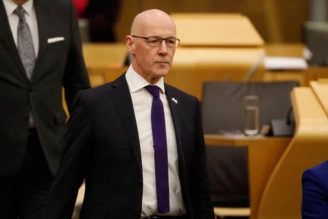 Temporary Cabinet Secretary for Finance and Economy John Swinney delivers the Scottish Budget for 2023-24 to the Scottish Parliament (Picture: Andrew Cowan/Getty)